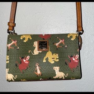 Sage green Lion King Dooney and Bourke crossbody bag